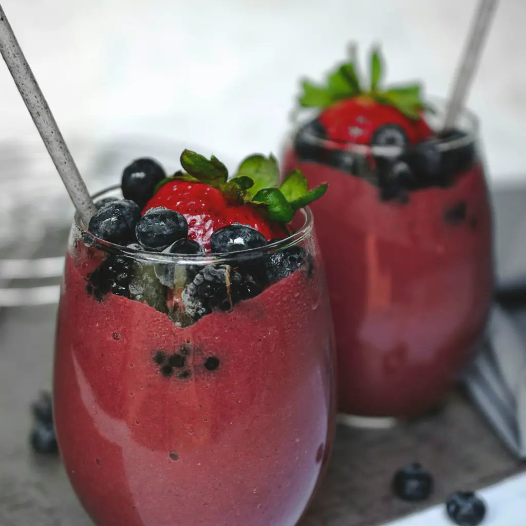 Berry yogurt protein shake for weight loss with strawberries and blueberries in a high protein meal replacement smoothie